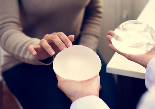 doctor showing implants